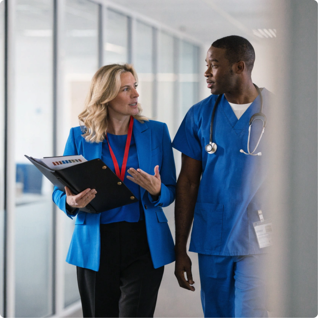 Medical science liaison speaking with a clinician